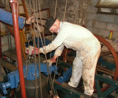 Arthur installing a bell